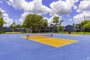 the tennis court at the estates apartments